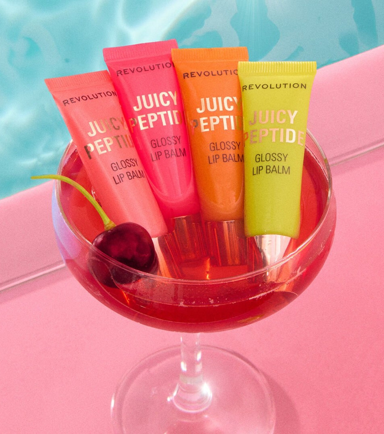 Makeup Revolution - Balsamo lucidalabbra Juicy Peptide - Shimmer Mai Tai Pink