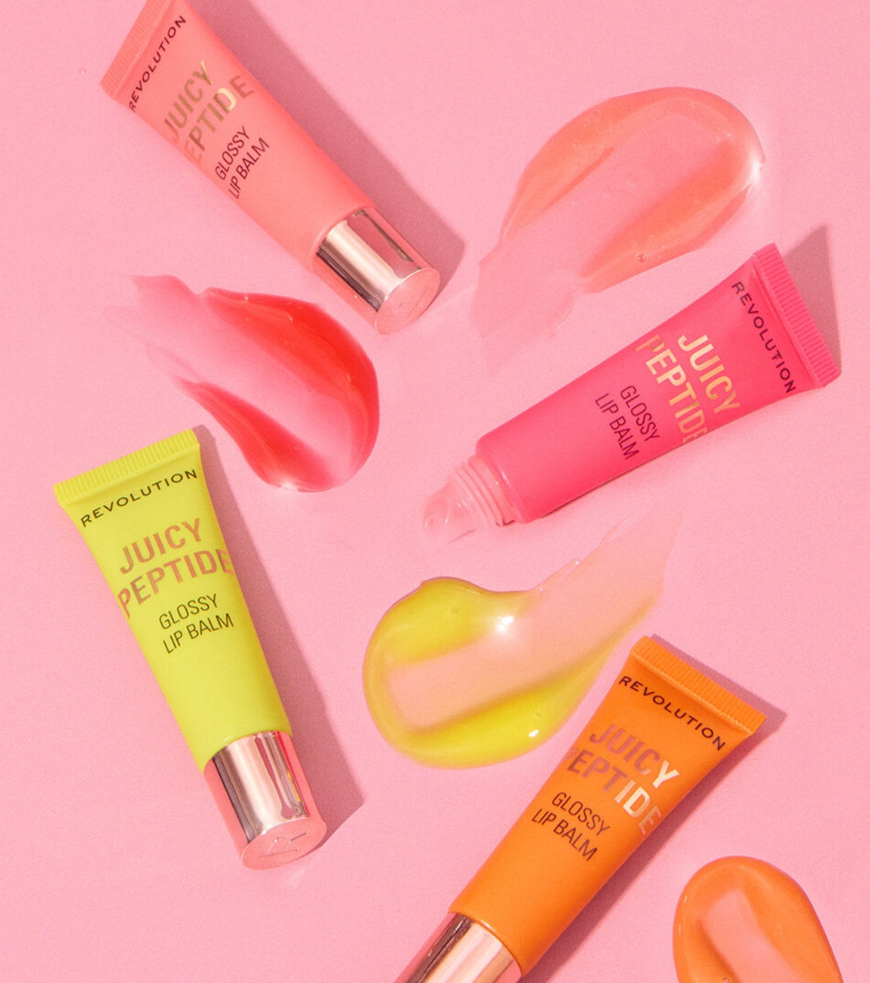 Makeup Revolution - Balsamo lucidalabbra Juicy Peptide - Shimmer Mai Tai Pink